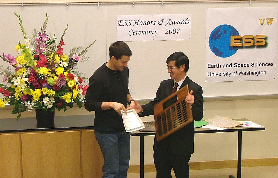 Photo of Jesse Einhorn 
	receiving the top undergraduate Merrill Prize.