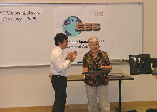 Photo of Liz Nesbitt receiving the Teaching Excellence Award.